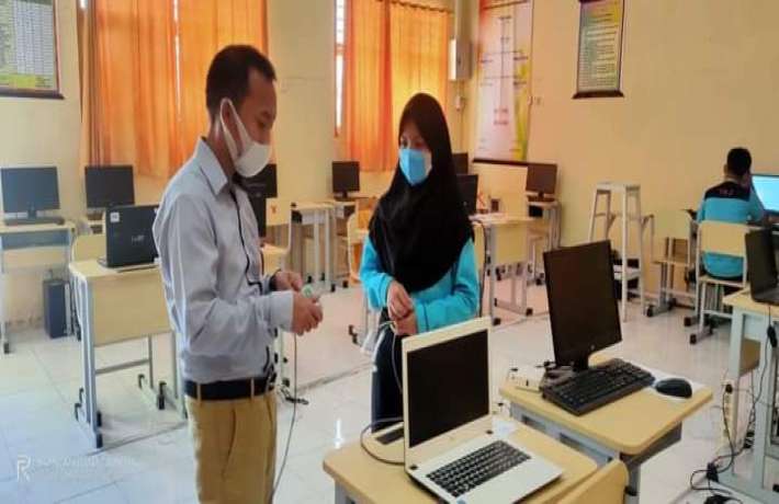 Pengenalan Pemasangan Jaringan Wireless Pada Kelas X Program Keahlian Teknik Jaringan Komputer dan Telekomunikasi  SMKN 2 Limboto
